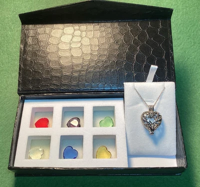 Silver Tone Heart Shaped Locket w/ 6 Interchangeable Center Stone Colors - Image 1 of 4