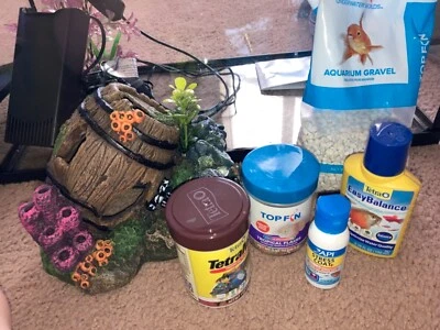 Pecera de 5 gal + pecera de 1/2 galón. Filtro, limpiador de alimentos y agua incluido  Foto 1 de 4