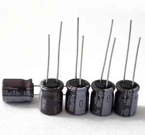 100uF 63V Kondensatoren Nichicon Electrolytic 105 C Low ESR 5er Pack 10mm x 12mm - Bild 1 von 6