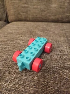 Duplo Car Base 2 x 6 with Open Hitch End and Red Wheels with Fake BoltsItem No: - Picture 1 of 4