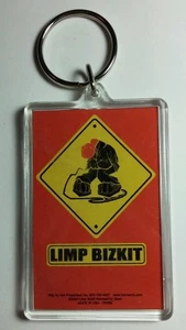 AS-IS LIMP BIZKIT CARTOON YELLOW SIGN MICROPHONE  BAND KEY CHAIN KEYCHAIN - Picture 1 of 1