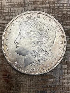 1889 $1 US Morgan Silver Dollar - Picture 1 of 2