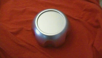 Tapacubos tapa central Frontier Xterra plata Nissan 2000-2004 usado Foto 1 de 4