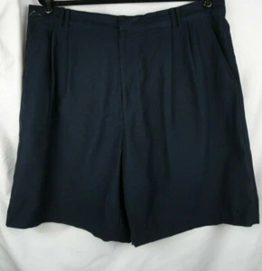 Pantaloncini da golf uomo Greg Norman taglia 38 blu navy usati in ottime condizioni - Foto 1 di 4
