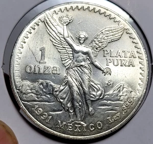 1991 Mexican Libertad 1 oz 99.9% Silver Coin - Type 1 Mintage 1,600,518 - Foto 1 di 4