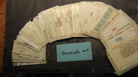 Stampsweis Venezuela MNH stamps in glassines est many 100s stamps Cover