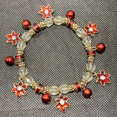 Pulsera KENNETH COLE Navidad Poinsettia Dije Esmalte y Cristales Elásticos B11E Foto 1 de 4