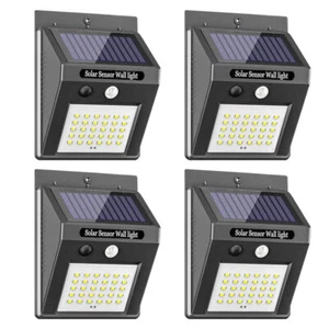 4X LED Solarleuchte Solarlampe mit Bewegungsmelder Außen Fluter Wandstrahler DHL - Bild 1 von 13