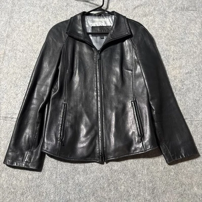 Chaqueta de cuero genuino Guess para mujer mediana negra bolsillos con cremallera completa suave Foto 1 de 4