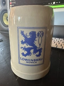 German Lowenbrau Munchen/Hofbrauhaus HB Beer Stein Mug 0.5 L Stoneware - Picture 1 of 5