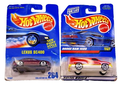 Nuevo Hot Wheels Lexus SC400 púrpura #264 Dodge Ram 1500 rojo/amarillo #797 Foto 1 de 2