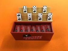 DOMINO TECATE WITH 2 WOOD HOLDERS.  SIZE: 1 3/4 x  7/8 x  1/2  INCHES.