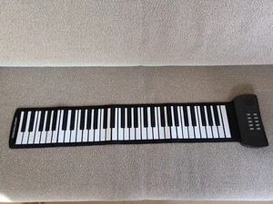 Piano digital enrollable portátil 61 teclas fuente de alimentación USB y batería compatible - Imagen 1 de 8