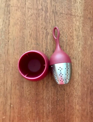 Infusor de té flotante ad hoc con soporte Foto 1 de 3
