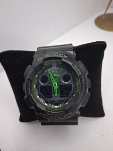 Casio G-Shock GA-100C schwarzes Gehäuse grüne Zeiger neue Batterie LESEN - Bild 1 von 6