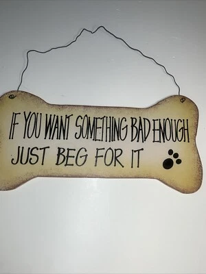 Placa de madera con forma de hueso 12"- “Si quieres algo malo lo suficientemente malo solo pídelo” Foto 1 de 4