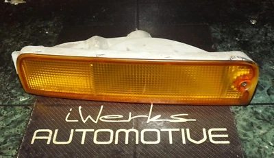 OEM 96-00 Nissan Pathfinder front bumper passenger turn signal blinker light FR - Imagem 1 de 4