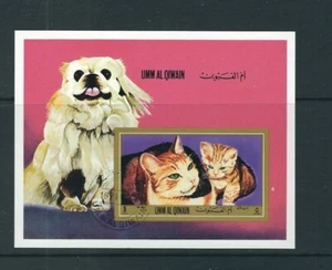 Hoja de recuerdos imperforados de Umm Al Qiwain/1971. Gatos y perros. - Imagen 1 de 1