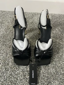 Women's Express Black and Gold Sculptural Heels Ankle Strap NEW Size 7 - Picture 1 of 5