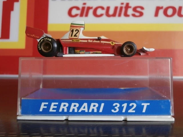ASPECT NEUF FERRARI 312T F1   N°12  SUPER CHAMPION - Photo 1/4