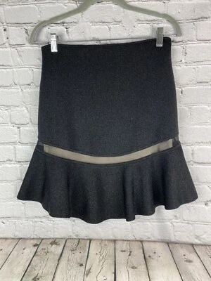 Юбка эластичная с подкладкой Alice + Olivia черная серебристая блестящая желтовато-коричневая размер средний б/у в отличном состоянии - Изображение 1 из 4