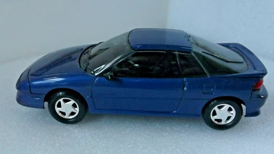 ERTL AMT 1991 CHEVROLET GEO STORM GSI Dealer Promo Model 1:25 COBALT BLUE # 6977 - Image 1 of 2