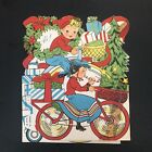 Vtg Christmas Greeting Card Boy & Girl Riding Bicycles Loaded With Packages Tree