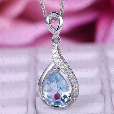 Colgante enchapado en oro blanco de 18 quilates de aguamarina natural y diamante talla pera de 4,30 quilates Foto 1 de 4