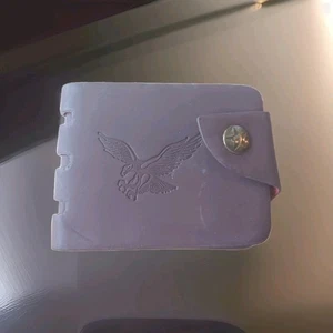 Braune Leder-Geldbörse mit Doppelfaltung, Druckknopfverschluss und geprägtem Adler - Bild 1 von 4