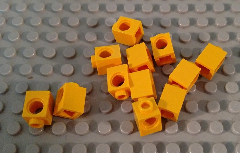 LEGO Lot of 12 Yellow 1x1 Technic Mindstorms Bricks with Pin Hole - Image 1 of 1