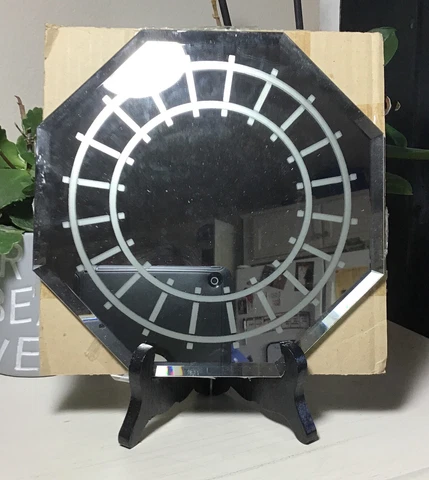 octagon shaped mirror with train tracks etched on top Cover