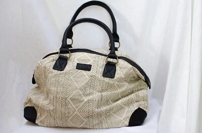 Bolso de fin de semana JOYN con adornos de cuero de lona bloqueados a mano Foto 1 de 4