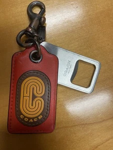 Coach CB409 Bottle Opener Key Fob With Coach Patch Gunmetal/Miami Red - Picture 1 of 4