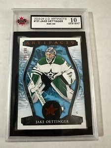 23-24 jake oettinger artifacts /299 ksa 10 - Picture 1 of 2