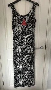 VESTIDO MAXI MONO ESTAMPADO PALMA. - Imagen 1 de 4