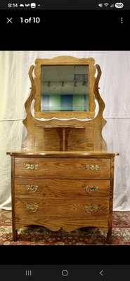 Tocador tocador vintage de madera de tigre Foto 1 de 4