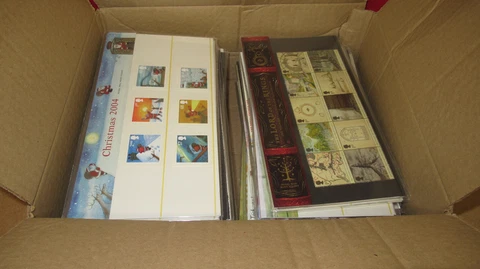 LOT OF 129  GB PRESENTATION PACKS WITH MINT STAMPS FACE VALUE £433 Cover