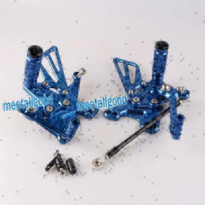 Juego de 12 juegos traseros reposapiés clavijas azul Fit Kawasaki Ninja ZX10R 11 - Imagen 1 de 4