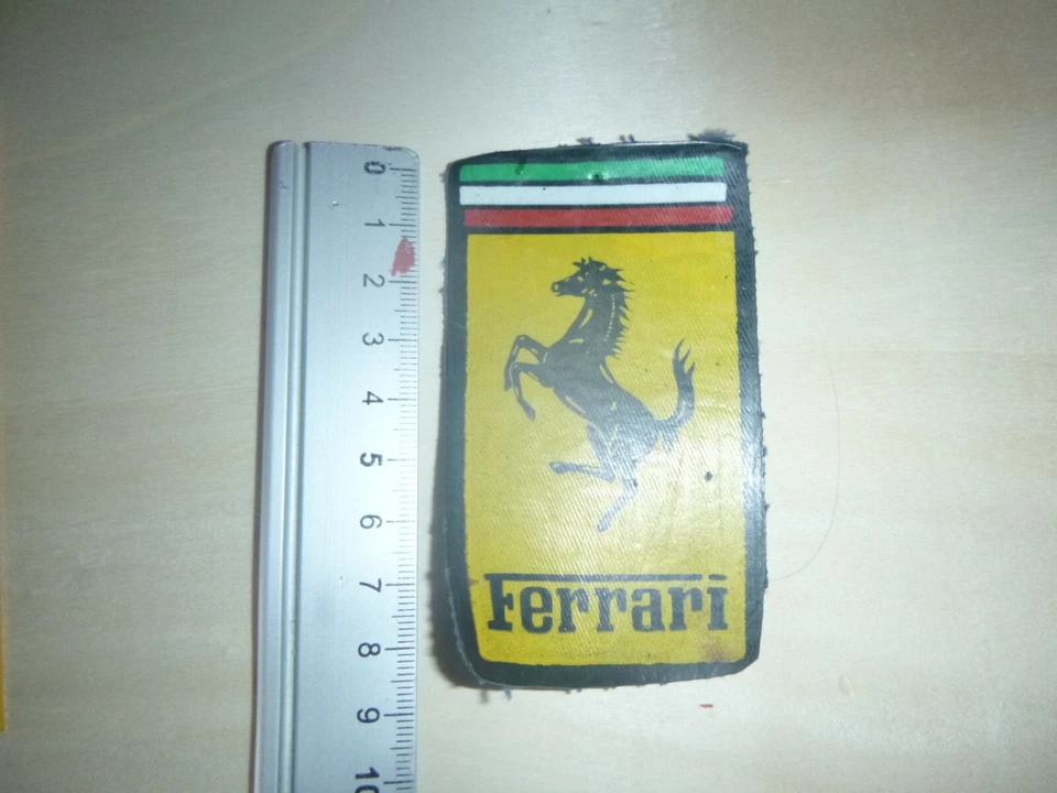 FERRARI , OLD PLASTIC PATCH  COVERALL  ( USED ) REMOVED - Image 1 of 1