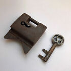 Iron padlock or lock with key, barbed spring mechanism, old or antique.