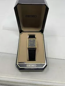 Reloj Seiko Hombre Hora/Fecha Cuarzo Analógico Tono Dorado Estuche y Manecillas Negro Trasero CAJA - Imagen 1 de 12