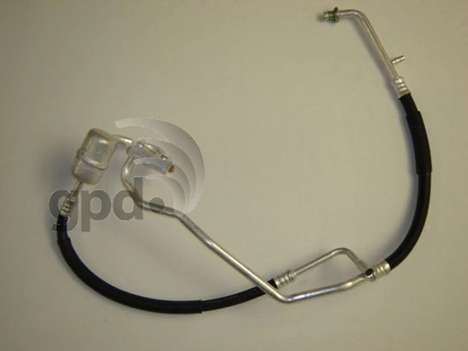 Manguera de refrigerante de aire acondicionado Global Parts Distributors 4811515 para 97-02 Escort Tracer Foto 1 de 4