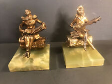 Pair of Art Deco bookends/Music/Onyx marble base/Gilt white metal/ C.1940/Clown