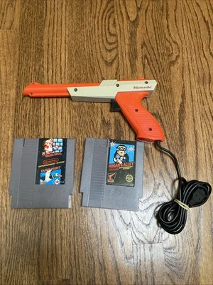 Оригинальный оранжевый охотничий пистолет 1985 Nintendo NES Zapper Duck NES-005 с 2 играми - Изображение 1 из 4