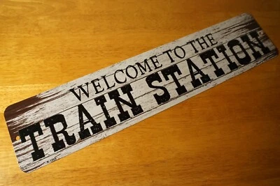 WELCOME TO THE TRAIN STATION Metal Sign Vintage Style Wood Grain Old West Decor - Image 1 of 4