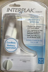 Conair Interplak Compact Wasser Zahnseide System Modell WJX01 - batteriebetrieben - Bild 1 von 2