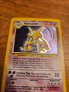 Pokémon TCG Alakazam Base Set 1/102 Holo 1999-2000 Wizards Base Set Copyright... - Picture 1 of 8
