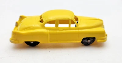 Vintage 1950s Hubley 4.25" Yellow Plastic Mid Size Car Transport Truck Cadillac - Image 1 of 4
