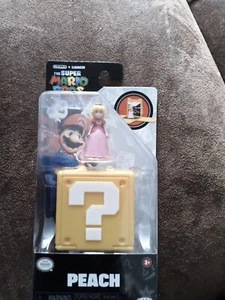 Super Mario Bros. Movie 3cm Peach Mini Figure with Question Blockb S13/ S28/S11 - Picture 1 of 1