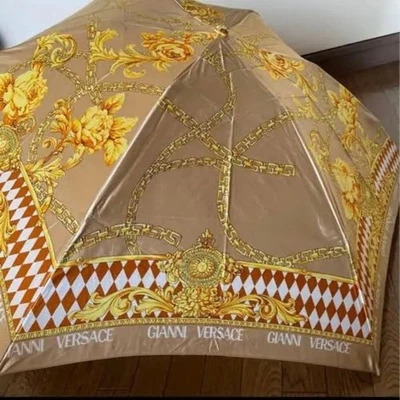 VERSACE Paraguas Floral Plegable con Patrón de Cadena Dorada Foto 1 de 4